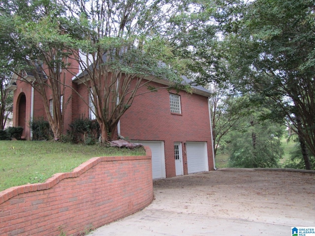 view of property exterior featuring a garage