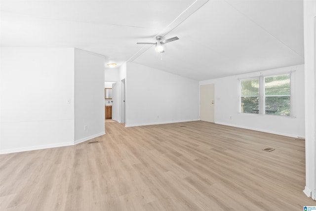 unfurnished living room featuring ceiling fan, lofted ceiling, and light hardwood / wood-style floors