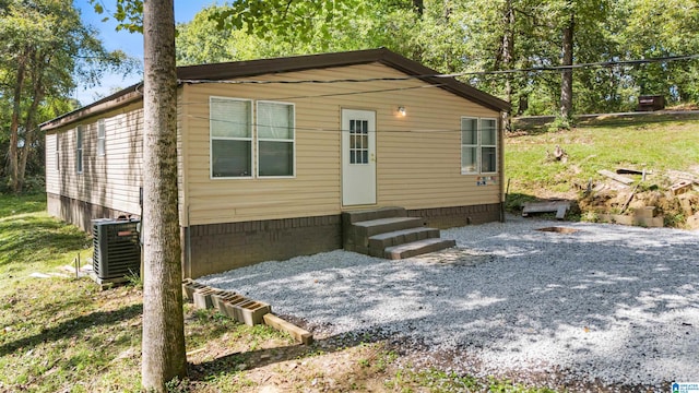 view of front of home with cooling unit