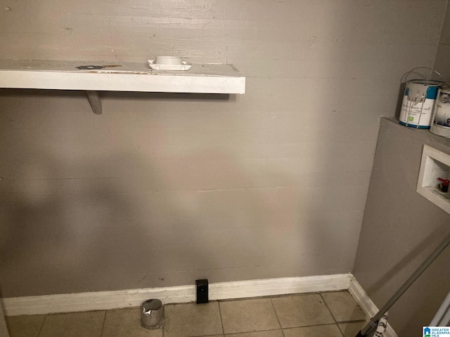 laundry room featuring hookup for a washing machine and tile patterned floors