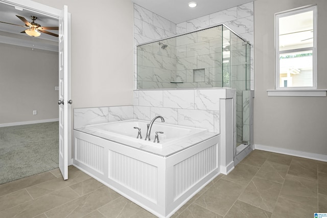 bathroom featuring ceiling fan and shower with separate bathtub