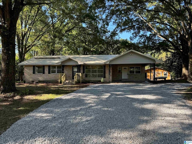 ranch-style home featuring covered porch