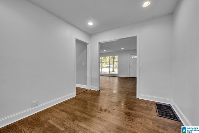 spare room featuring hardwood / wood-style flooring