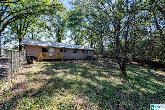 view of yard featuring a deck