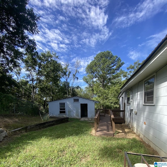 view of yard with a wooden deck