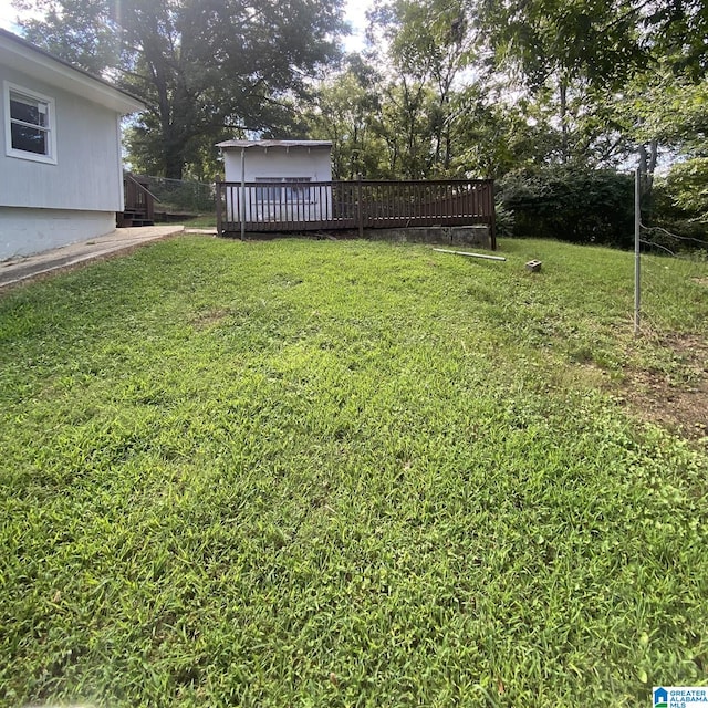 view of yard featuring a deck