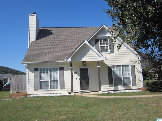 view of front of house with a front lawn