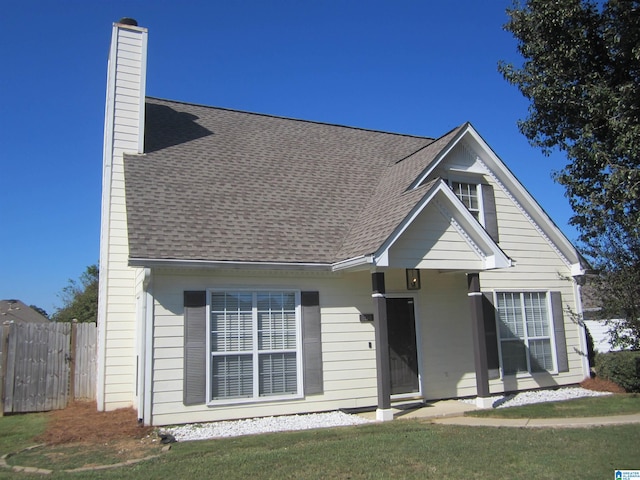 view of front of home with a front yard