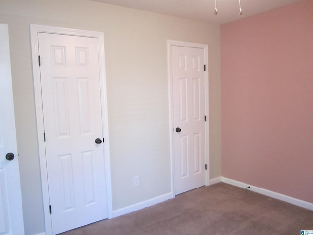 unfurnished bedroom with carpet