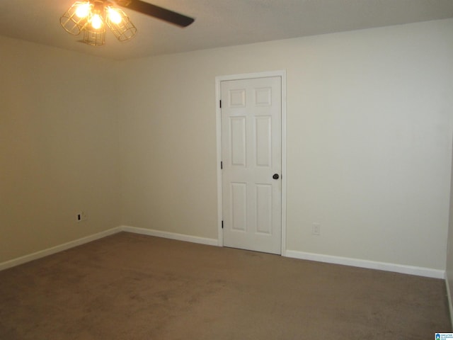 carpeted empty room with ceiling fan