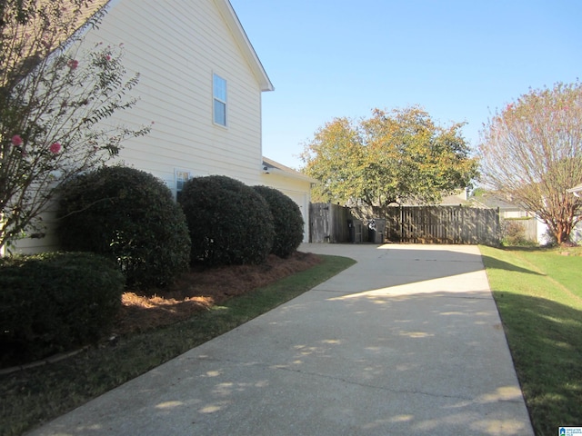 view of home's exterior with a yard