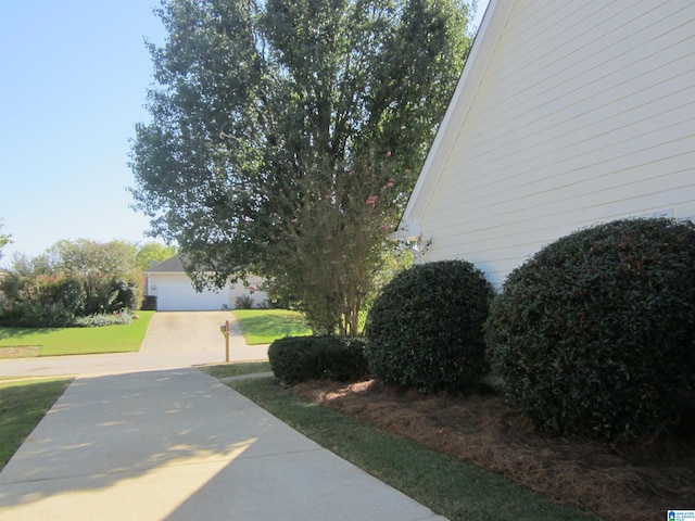 view of yard with a garage