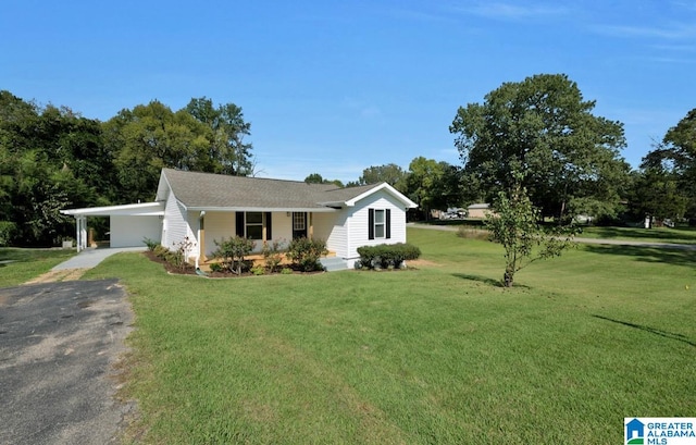 ranch-style home with a carport and a front yard