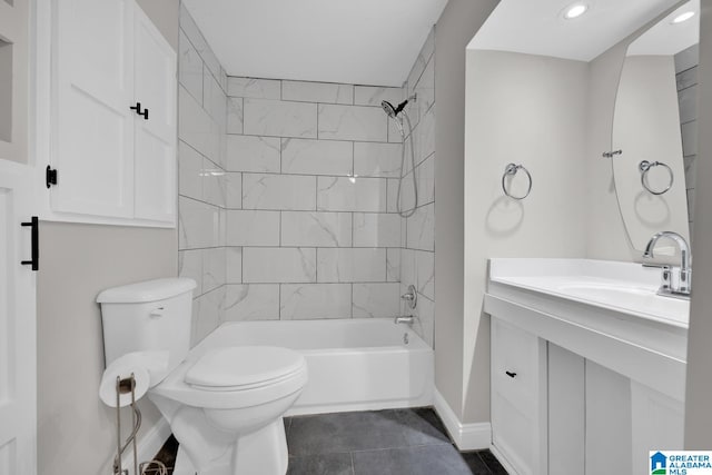 full bathroom with tiled shower / bath combo, tile patterned floors, vanity, and toilet