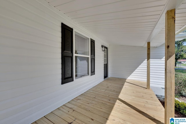 wooden terrace with covered porch