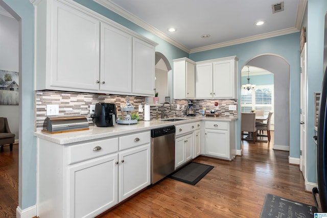 kitchen featuring white cabinets, dishwasher, crown molding, and dark wood-type flooring