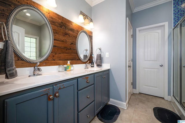 bathroom featuring ornamental molding, tile patterned flooring, a shower with shower door, and vanity