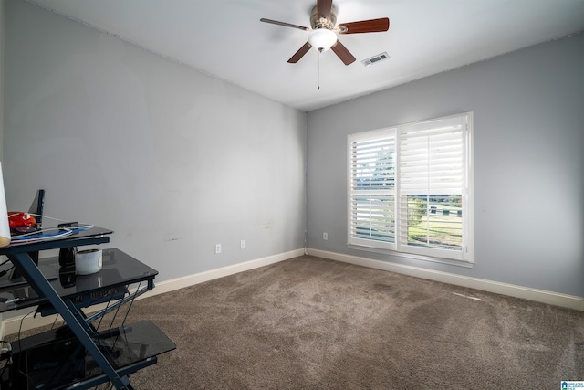 office space featuring ceiling fan and carpet flooring