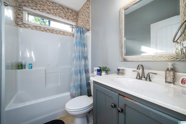 full bathroom featuring vanity, toilet, and shower / bathtub combination with curtain