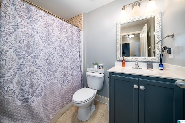 bathroom featuring walk in shower, vanity, toilet, and tile patterned floors