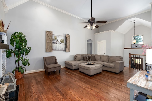 living room with ceiling fan, crown molding, and dark hardwood / wood-style flooring