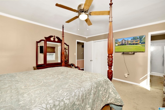 carpeted bedroom featuring a closet, ceiling fan, and crown molding