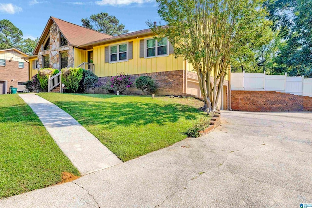 view of front of home with a front yard