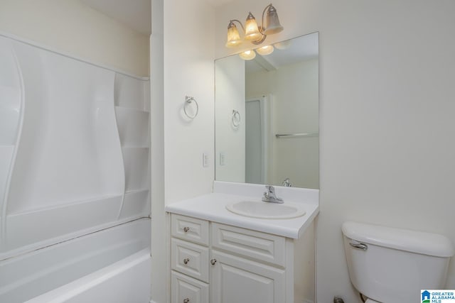 full bathroom featuring  shower combination, vanity, and toilet