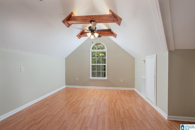 bonus room with vaulted ceiling with beams, light hardwood / wood-style flooring, and ceiling fan