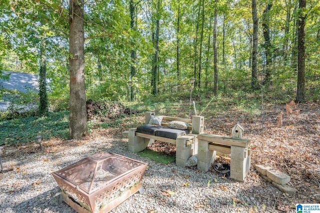 view of yard featuring a fire pit