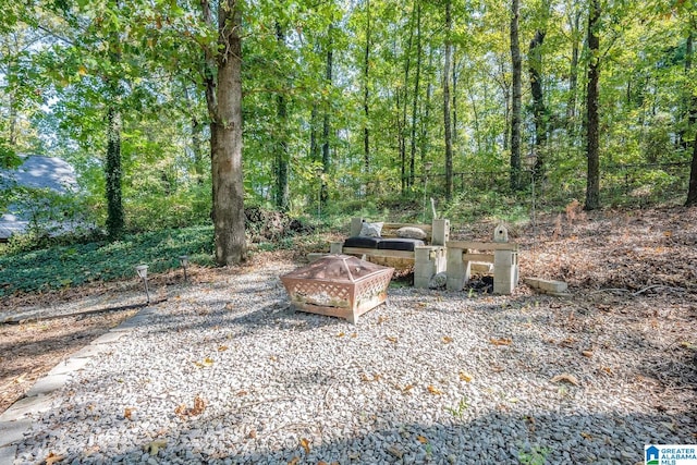 view of patio / terrace featuring a fire pit