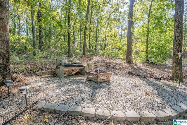 view of patio with a fire pit