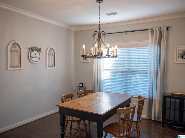 dining space with dark hardwood / wood-style floors, a chandelier, and crown molding