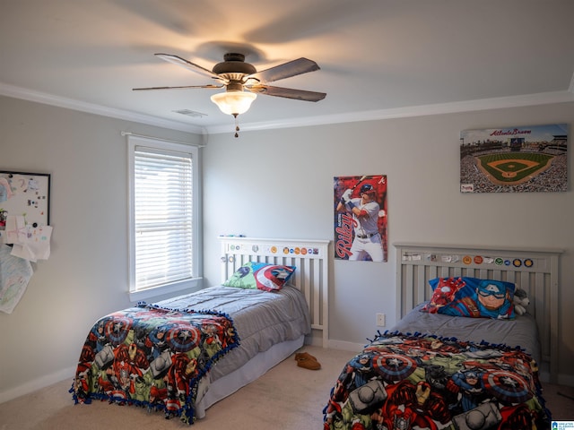 bedroom featuring crown molding, ceiling fan, and carpet