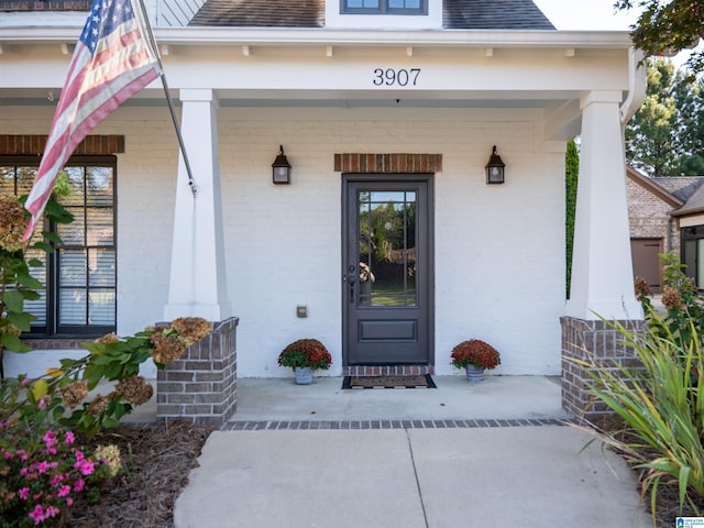 entrance to property with a porch