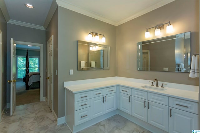 bathroom featuring vanity and ornamental molding