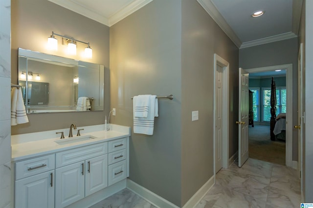 bathroom with vanity and ornamental molding