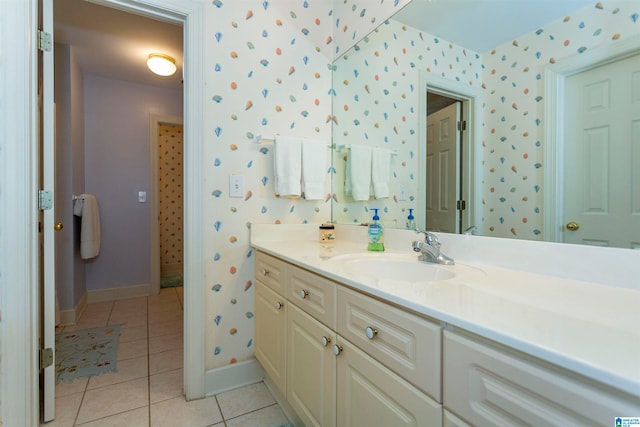 bathroom featuring tile patterned flooring and vanity