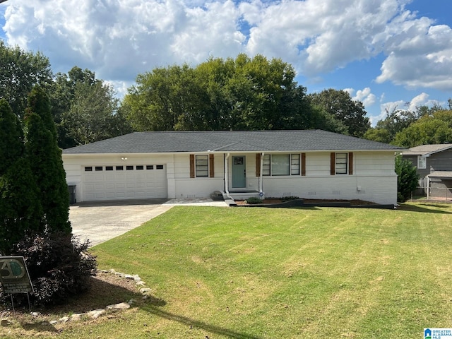 ranch-style home with a garage and a front yard