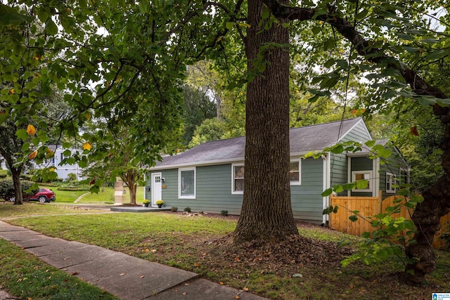 view of home's exterior featuring a lawn