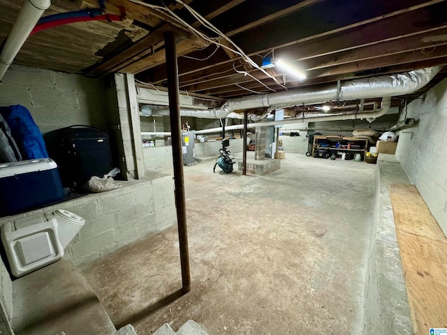 basement featuring water heater