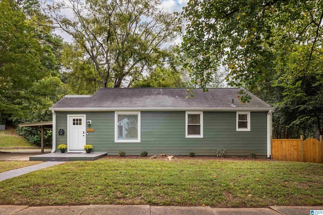 view of front of property with a front lawn