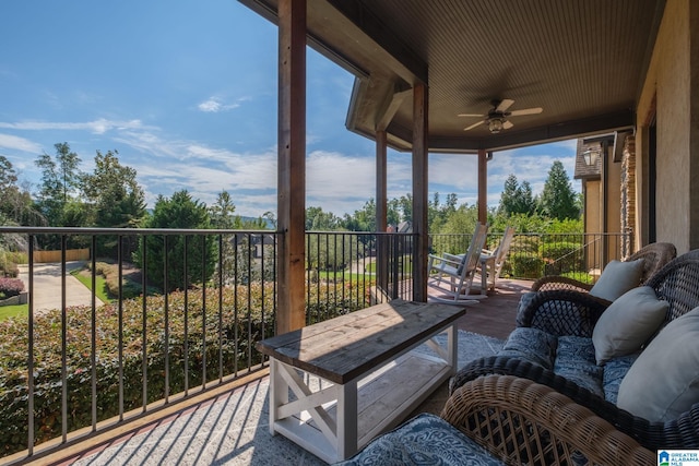 exterior space featuring ceiling fan and an outdoor hangout area