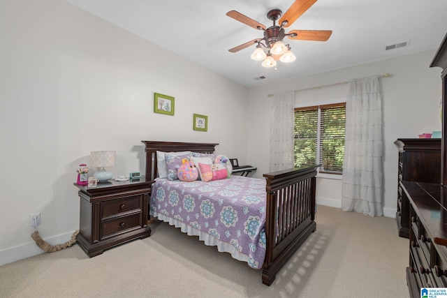 bedroom featuring ceiling fan and light colored carpet