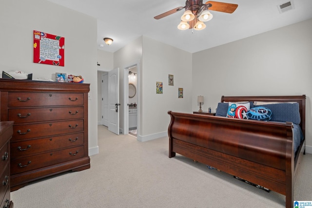 carpeted bedroom featuring ceiling fan and connected bathroom