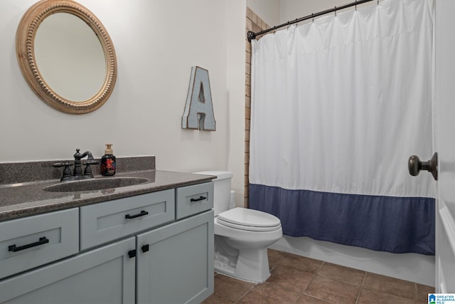 full bathroom with vanity, tile patterned flooring, toilet, and shower / tub combo with curtain