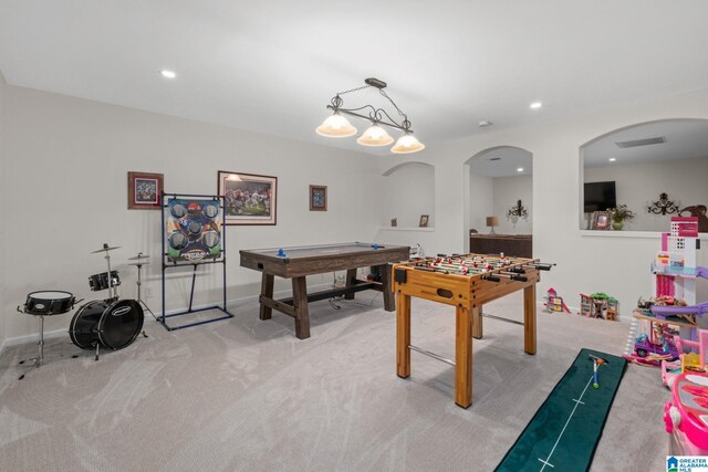 rec room with light carpet and pool table