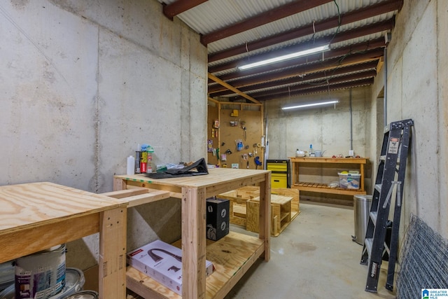 basement with a workshop area