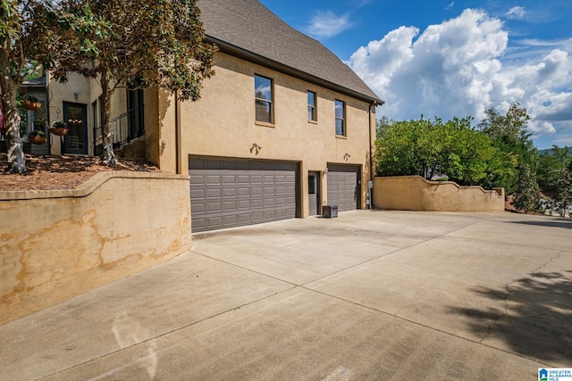 view of home's exterior with a garage