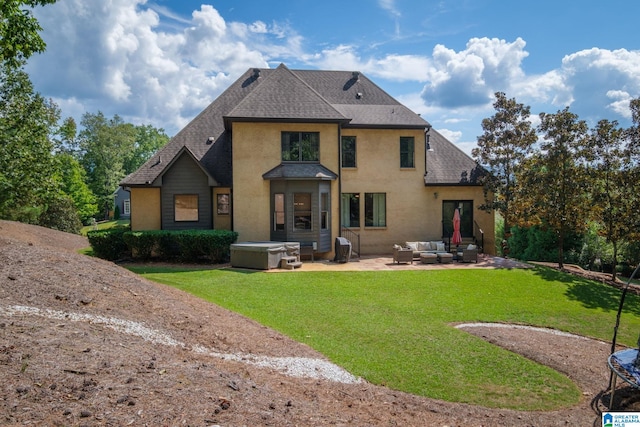 back of house featuring an outdoor hangout area, a yard, and a patio